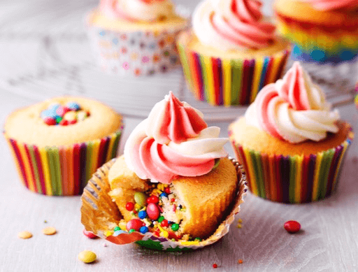 Surprise Rainbow Pinata Cupcakes 