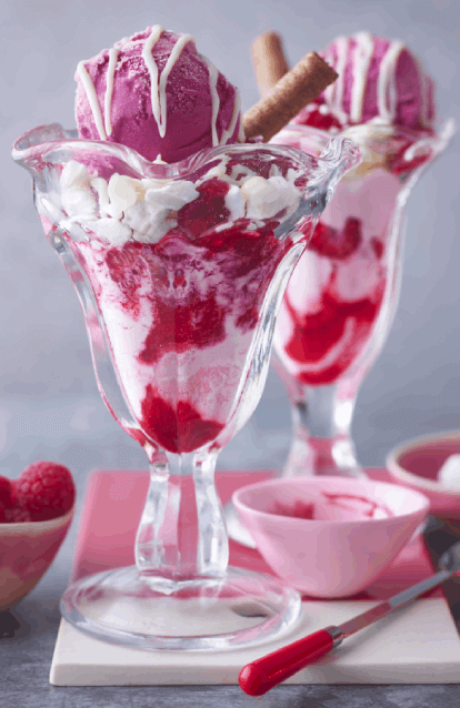 raspberry sundae in glass with original carnation sauce