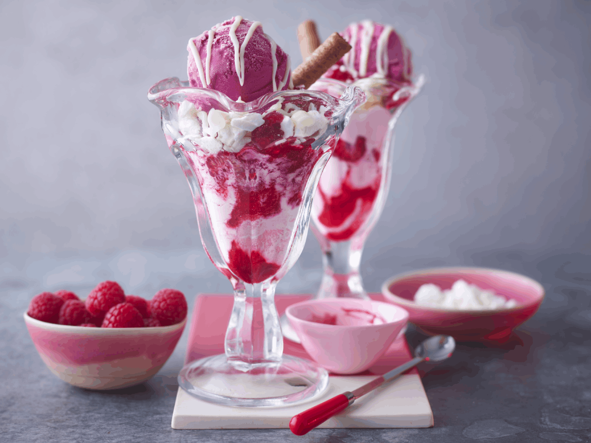 raspberry sundae in glass with original carnation sauce