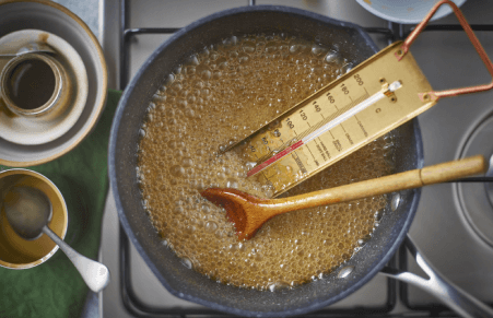 Vegan Fudge recipe step 2 bringing the ingredient to the boil in a saucepan