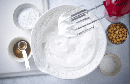 Vegan Key Lime Pie aquafaba topping whipped in a bowl