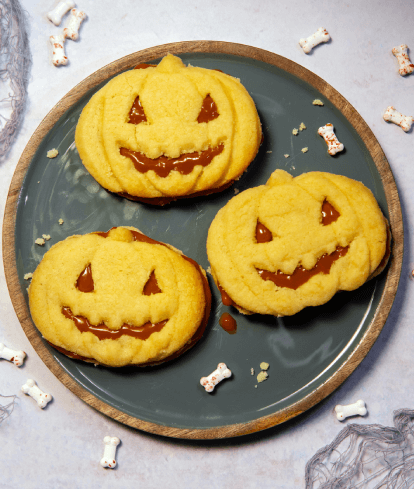 halloween caramel sandwich shortbread biscuits in the shape of pumpkins