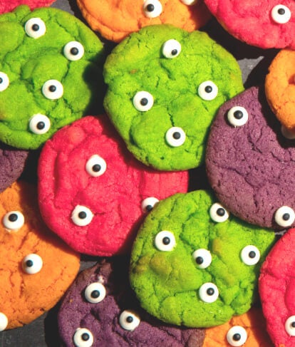 halloween monster brightly coloured cookies with googly eyes