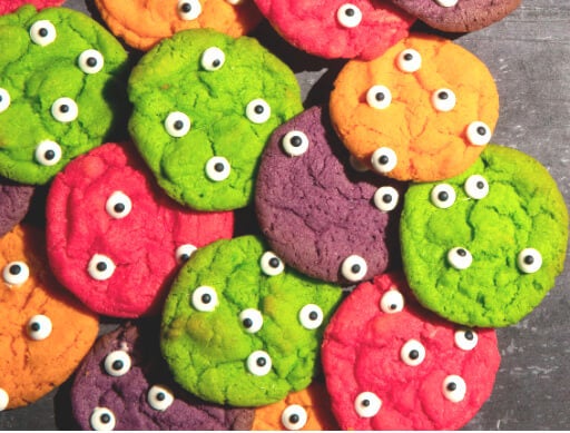 halloween monster brightly coloured cookies with googly eyes
