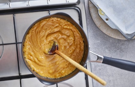 Easter butter toffee ingredients boiling in saucepan