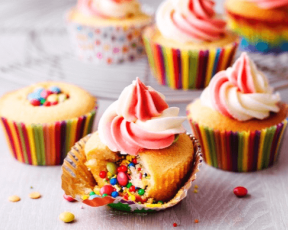 Surprise Rainbow Pinata Cupcakes