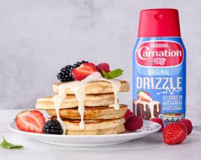 carnation original drizzle sauce with pancakes topped with fruit and sweetened condensed milk sauce